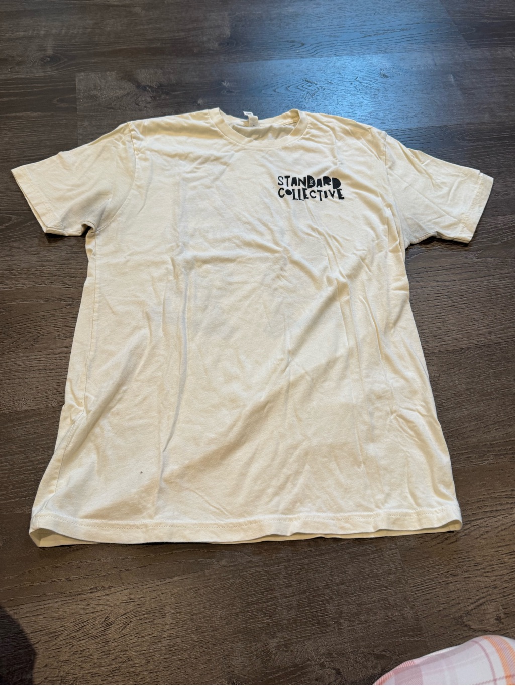Next Level Apparel Cream Short Sleeve Tee With Black Logo